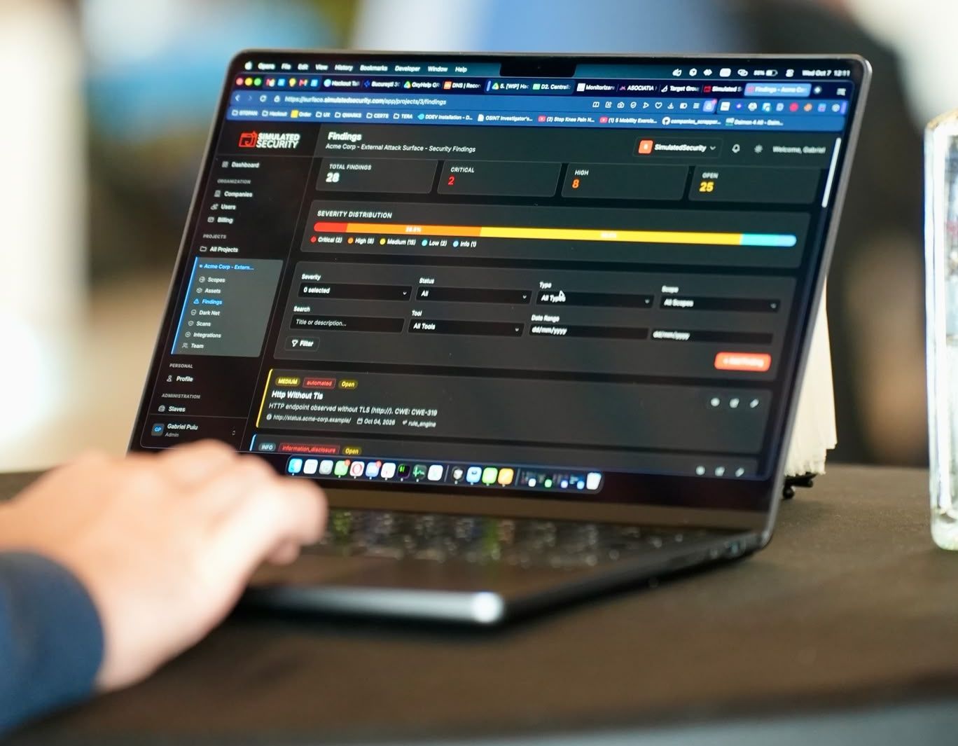 Security findings sorted by severity on a laptop