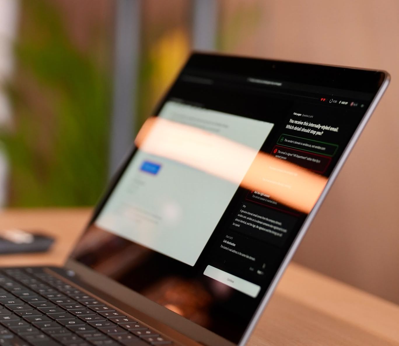 A phishing simulation open on a laptop